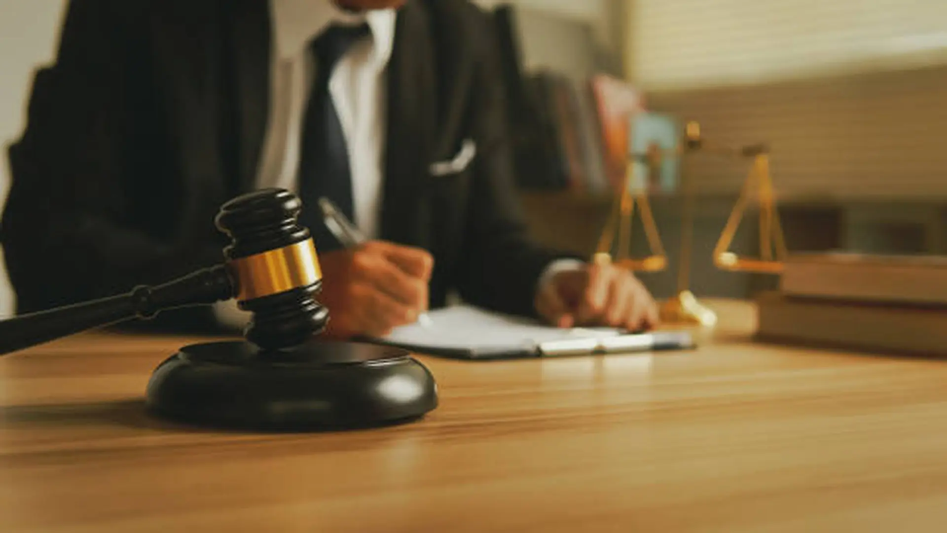 Criminal defense attorney courtroom gavel and legal documents in Garrett County Maryland courthouse